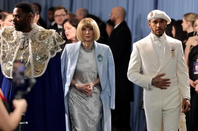NEW YORK, NEW YORK - MAY 05: (L-R) Colman Domingo, Met Gala Co-Chair, Anna Wintour, Met Gala Chair, and Lewis Hamilton, Met Gala Co-Chair attend the 2025 Met Gala Celebrating "Superfine: Tailoring Black Style" at Metropolitan Museum of Art on May 05, 2025 in New York City.   Savion Washington/Getty Images/AFP (Photo by Savion Washington / GETTY IMAGES NORTH AMERICA / Getty Images via AFP)<!-- NICAID(16030481) -->