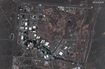 (FILES) This handout satellite image provided by Maxar Technologies shows the Natanz nuclear enrichment facility in central Iran on June 14, 2025 after it was hit by Israeli strikes. President Donald Trump said June 21, 2025 the US military has carried out a "very successful attack" on three Iranian nuclear sites, including the underground uranium enrichment facility at Fordo. "We have completed our very successful attack on the three Nuclear sites in Iran, including Fordow, Natanz, and Esfahan," Trump said in a post on his Truth Social platform. (Photo by Satellite image ©2025 Maxar Technologies / AFP) / RESTRICTED TO EDITORIAL USE - MANDATORY CREDIT "AFP PHOTO / SATELLITE IMAGE ©2025 MAXAR TECHNOLOGIES " - NO MARKETING NO ADVERTISING CAMPAIGNS - DISTRIBUTED AS A SERVICE TO CLIENTS<!-- NICAID(16064847) -->