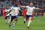 England's forward #17 Bukayo Saka (L) celebrates scoring his team's second goal during the Qatar 2022 World Cup Group B football match between England and Iran at the Khalifa International Stadium in Doha on November 21, 2022. (Photo by ADRIAN DENNIS / AFP)Editoria: SPOLocal: DohaIndexador: ADRIAN DENNISSecao: soccerFonte: AFPFotógrafo: STF<!-- NICAID(15271896) -->