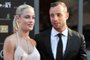 (FILES) This picture taken on November 4, 2012 during the Feather Awards held at Melrose Arch in Johannesburg shows South Africa's Olympic sprint star Oscar Pistorius and his model girlfriend Reeva Steenkamp. The mother of Reeva Steenkamp, a South African model killed by ex-Olympian Oscar Pistorius, is the one "serving a life sentence", she said in a statement on January 5, 2024 ahead of his release from prison. (Photo by LUCKY NXUMALO / AFP)<!-- NICAID(15642456) -->