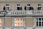 Armed police are seen on the balcony of the Charles University in central Prague, on December 21, 2023. Czech police said a shooting in a university building in central Prague has left "dead and wounded people", without providing further details."Based on the initial information we have, we can confirm dead and wounded people on the scene," police said on X, formerly Twitter. Czech media said the shooting had occurred at the Faculty of Arts whose teachers and students were instructed to lock themselves up as the police action was under way. (Photo by Michal CIZEK / AFP)<!-- NICAID(15631802) -->
