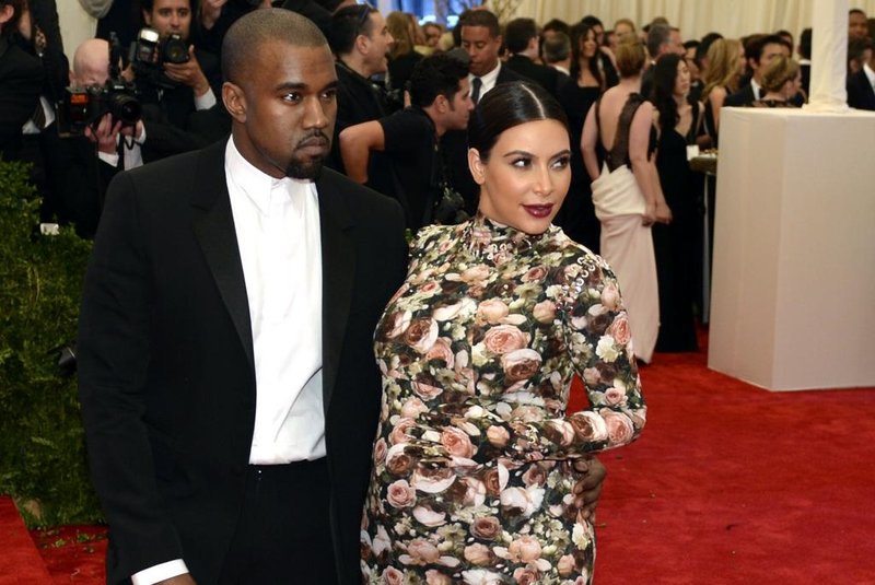 Kim Kardashian and Kanye West  attend the Costume Institute Benefit at The Metropolitan Museum of Art May 6, 2013, celebrating the opening of Punk: Chaos to Couture.  AFP PHOTO / TIMOTHY A. CLARY<!-- NICAID(9355348) -->