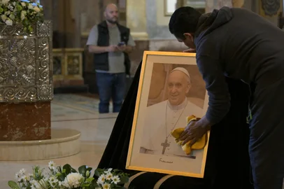 A portrait of late Pope Francis is seen at the Buenos Aires Cathedral on April 21, 2025, following the death of Pope Francis in the Vatican. Pope Francis died on April 21, 2025 aged 88, a day after making a much hoped-for appearance at Saint Peter's Square on Easter Sunday, the Vatican said in a statement. (Photo by JUAN MABROMATA / AFP)<!-- NICAID(16020833) -->