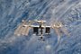 (FILES) In this file photo taken on March 07, 2011 this NASA handout image shows a close-up view of the International Space Station is featured in this image photographed by an STS-133 crew member on space shuttle Discovery after the station and shuttle began their post-undocking relative separation. - The United States said Monday it was investigating a "debris-generating event in outer space" after astronauts on the International Space Station were forced to prepare for a possible evacuation. (Photo by NASA / AFP)<!-- NICAID(14941949) -->