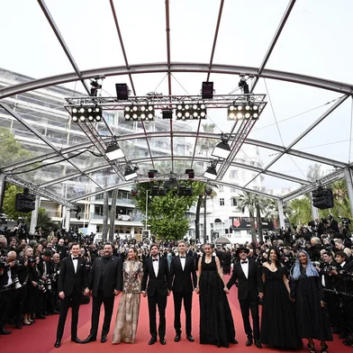 (From L) US actor Paul Dano, French actor Denis Menochet, US actress Brie Larson, Swedish film director and President of the Jury of the 76th Cannes Film Festival Ruben Ostlund, Argentinian film director Damian Szifron, French film director Julia Ducournau, French-Afghan writer and film director Atiq Rahimi, Moroccan film director Maryam Touzani and Zambian film director Rungano Nyoni pose as they arrive for the opening ceremony and the screening of the film "Jeanne du Barry" during the 76th edition of the Cannes Film Festival in Cannes, southern France, on May 16, 2023. (Photo by LOIC VENANCE / AFP)Editoria: ACELocal: CannesIndexador: LOIC VENANCESecao: cinemaFonte: AFPFotógrafo: STF<!-- NICAID(15429933) -->