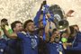Chelsea's Spanish defender Cesar Azpilicueta (R) celebrates with the trophy after winning the UEFA Champions League final football match at the Dragao stadium in Porto on May 29, 2021. (Photo by PIERRE-PHILIPPE MARCOU / POOL / AFP)<!-- NICAID(14796068) -->