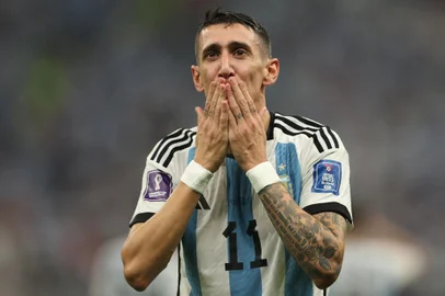 Argentina's midfielder #11 Angel Di Maria celebrates scoring his team's second goal during the Qatar 2022 World Cup final football match between Argentina and France at Lusail Stadium in Lusail, north of Doha on December 18, 2022. (Photo by Adrian DENNIS / AFP)Editoria: SPOLocal: DohaIndexador: ADRIAN DENNISSecao: soccerFonte: AFPFotógrafo: STF<!-- NICAID(15298475) -->