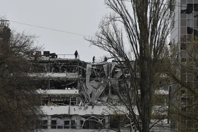 Ukrainian rescuers work on top of a damaged multi-storey offices building following a Russian missile strike in Kyiv on April 6, 2025, amid the Russian invasion of Ukraine. Russia "in the early hours of this morning launched a massive nationwide attack on Ukraine using ballistic missiles, cruise missiles and drones," said Ukrainian first deputy prime minister.