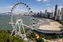 BalneÃ¡rio CamboriÃº, Santa Catarina, Brazil, circa March 2022: Aerial of BalneÃ¡rio CamboriÃº city and famous Ferris wheel of BalneÃ¡rio Camboriu, the Big Wheel.Fonte: 495580172<!-- NICAID(15308833) -->