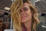 Carolina Dieckmann rebate críticas após acusação de derrubar bolo de propósito