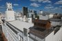 CAXIAS DO SUL, RS, BRASIL, 10/10/2023. Lugares que só a gente entra: terraço do prédio da antiga metalúrgica Abramo Eberle, em Caxias, abriga casinha de madeira e relógio, cujo acesso é restrito.  Na foto, Valdenir Araújo Carvalho, 33 anos, conhecido por todos como Maranhão, que é o zelador do espaço. Case de reportagem para a série Olho Mágico, na qual mostramos aos leitores lugares de acesso restrito em Caxias. (Porthus Junior/Agêncis RBS)<!-- NICAID(15570132) -->