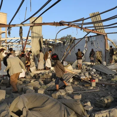 Yemenis inspect the rubble of a building hit in US strikes in the northern province of Saada on April 28, 2025. Huthi media in Yemen said on April 28 that US strikes targeted a migrant detention centre in Saada, killing at least 68 people. (Photo by AFP)<!-- NICAID(16025556) -->