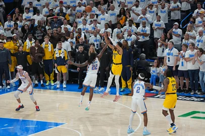 OKLAHOMA CITY, OK - JUNE 5: Tyrese Haliburton #0 of the Indiana Pacers shoots the game winning basket against the Oklahoma City Thunder during Game One of the 2025 NBA Finals on June 5, 2025 at Paycom Center in Oklahoma City, Oklahoma. NOTE TO :  expressly acknowledges and agrees that, by ing and or using this photograph,  is consenting to the  and conditions of the Getty Images License Agreement. Mandatory Copyright Notice: Copyright 2025 NBAE   Morgan Givens/NBAE via Getty Images/AFP (Photo by NBA Photos / NBAE / Getty Images / Getty Images via AFP)<!-- NICAID(16054618) -->