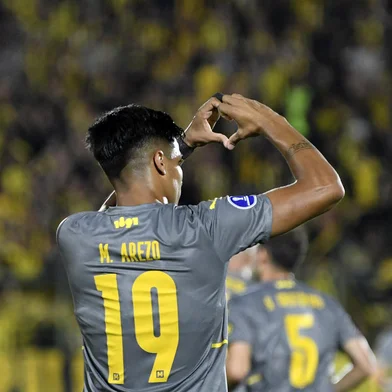 Penarol's forward Matias Arezo celebrates after scoring a goal during the Copa Sudamericana first stage football match between Uruguay's River Plate and Uruguay's Peñarol, at the Domingo Burgueño stadium in Maldonado, Uruguay, on March 7, 2023. (Photo by Pablo PORCIUNCULA / AFP)Editoria: SPOLocal: MaldonadoIndexador: PABLO PORCIUNCULASecao: soccerFonte: AFPFotógrafo: STF<!-- NICAID(15810742) -->