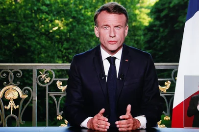 This screen shot shows France's President Emmanuel Macron speaking during a televised address to the nation during which he announced he is dissolving the National Assembly, French Parliament lower house, and calls new general elections on June 30, in Paris on June 9, 2024. (Photo by Ludovic MARIN / AFP)<!-- NICAID(15784239) -->