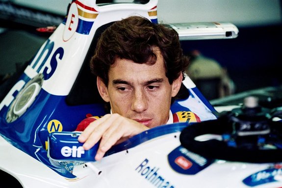 Senna1747(FILES) - Brazilian F1 driver Ayrton Senna adjusts his rear view mirror in the pits 01 May 1994 before the start of the San Marino Grand Prix. Senna died after crashing in the seventh lap. A legend intact. Thirty years after his death at the age of 34 on the Italian Imola circuit on 1 May 1994, the Brazilian Ayrton Senna is still adored, and his death has helped to improve safety in Formula 1. While safety had already made progress over the previous twenty years, thanks to the initiative of drivers such as three-time world champion Jackie Stewart, Senna's death triggered a new effort, as demonstrated by the deformable structures, drivers' equipment and clearance zones on the circuits. (Photo by JEAN-LOUP GAUTREAU / AFP)Editoria: SPOLocal: ImolaIndexador: JEAN-LOUP GAUTREAUSecao: motor racingFonte: AFPFotógrafo: STF<!-- NICAID(15748965) -->