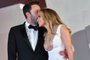 US actor Ben Affleck kisses US actress and singer Jennifer Lopez as they arrive for the screening of the film "The Last Duel" presented out of competition on September 10, 2021 during the 78th Venice Film Festival at Venice Lido. (Photo by Filippo MONTEFORTE / AFP)Editoria: ACELocal: VeniceIndexador: FILIPPO MONTEFORTESecao: cinema industryFonte: AFPFotógrafo: STF<!-- NICAID(14886964) -->