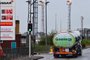 A tanker drives by Essar Oil's Stanlow refinery in Ellesmere port, northwest England on September 27, 2021. - Britain experienced further 'panic-buying' of motor fuel today as a shortage of lorry drivers on Covid and Brexit fallout could reportedly prompt the government to use the army to make deliveries. (Photo by Paul ELLIS / AFP)<!-- NICAID(14900001) -->