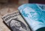 Dólar cai ao menor patamar em um ano por emprego nos EUA e sinais de pacificação