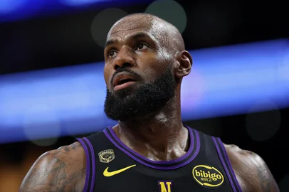 LOS ANGELES, CALIFORNIA - MAY 11: LeBron James #23 of the Los Angeles Lakers looks on against the Oklahoma City Thunder during the first quarter in Game Four of the Second Round of the NBA Western Conference Playoffs at Crypto.com Arena on May 11, 2026 in Los Angeles, California. NOTE TO USER: User expressly acknowledges and agrees that, by downloading and or using this photograph, User is consenting to the terms and conditions of the Getty Images License Agreement.   Luke Hales/Getty Images/AFP (Photo by Luke Hales / GETTY IMAGES NORTH AMERICA / Getty Images via AFP)<!-- NICAID(16317814) -->