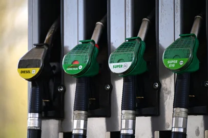 (FILES) A photo shows a petrol pump at a petrol station at the motorway A43 near Muenster on April 1, 2026. Demand for crude oil will likely see the biggest slump in the second quarter since the Covid pandemic slammed the global economy in 2020, the International Energy Agency warned on April 14, 2026. (Photo by Ina FASSBENDER / AFP)<!-- NICAID(16272098) -->