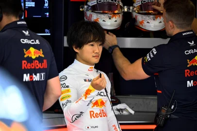 RB's Japanese driver Yuki Tsunoda prepares for the race prior to the Formula One Hungarian Grand Prix at the Hungaroring circuit in Mogyorod near Budapest, Hungary, on August 3, 2025. (Photo by Ferenc ISZA / AFP)<!-- NICAID(16093937) -->