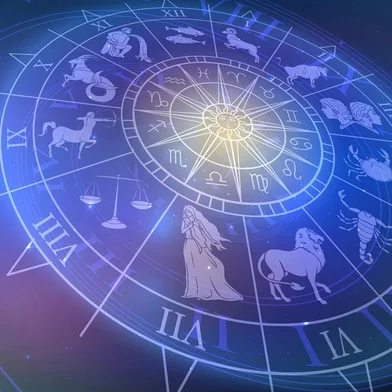 Wheel chart with zodiac signs in space, astrology and horoscope<!-- NICAID(15316343) -->