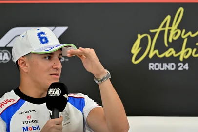 GIUSEPPE CACACE / AFP Red Bull Racing's French driver Isack Hadjar attends a press conference ahead of the Abu Dhabi Formula One Grand Prix at the Yas Marina Circuit in Abu Dhabi on December 4, 2025. (Photo by Giuseppe CACACE / AFP)<!-- NICAID(16182484) -->