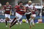 Flamengo's Chilean midfielder Erick Pulgar (L) and Sao Paulo's Argentine forward Jonathan Calleri fight for the ball during the Copa do Brasil final first leg football match between Flamengo and Sao Paulo at Maracana Stadium in Rio de Janeiro, Brazil, on September 17, 2023. (Photo by MAURO PIMENTEL / AFP)Editoria: SPOLocal: Rio de JaneiroIndexador: MAURO PIMENTELSecao: soccerFonte: AFPFotógrafo: STF<!-- NICAID(15543287) -->