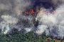 Aerial picture showing smoke from a two-kilometre-long stretch of fire billowing from the Amazon rainforest about 65 km from Porto Velho, in the state of Rondonia, in northern Brazil, on August 23, 2019. - Bolsonaro said Friday he is considering deploying the army to help combat fires raging in the Amazon rainforest, after news about the fires have sparked protests around the world. The latest official figures show 76,720 forest fires were recorded in Brazil so far this year -- the highest number for any year since 2013. More than half are in the Amazon. (Photo by Carl DE SOUZA / AFP)<!-- NICAID(14219254) -->