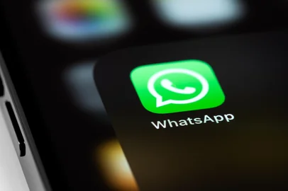 WhatsApp mobile icon app on screen smartphone iPhone macro. WhatsApp is a popular free instant text messaging system for mobile and other platforms. Moscow, Russia - June 15, 2021<!-- NICAID(15767366) -->