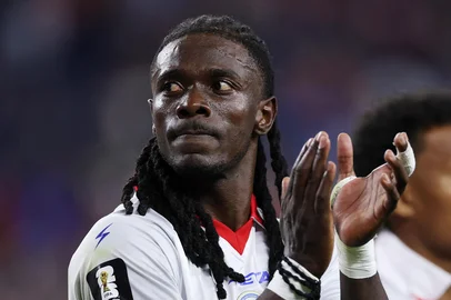 FOXBOROUGH, MASSACHUSETTS - JUNE 13: Ricardo Ade #4 of Haiti applauds fans after the team's 0-1 defeat in the FIFA World Cup 2026 Group C match between Haiti and Scotland at Boston Stadium on June 13, 2026 in Foxborough, Massachusetts.   Justin Setterfield/Getty Images/AFP (Photo by Justin Setterfield / GETTY IMAGES NORTH AMERICA / Getty Images via AFP)<!-- NICAID(16307258) -->