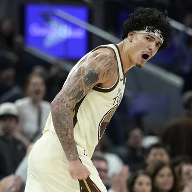 SAN FRANCISCO, CALIFORNIA - FEBRUARY 09: Gui Santos #15 of the Golden State Warriors reacts after making a three-point shot against the Memphis Grizzlies in the second half at Chase Center on February 09, 2026 in San Francisco, California. NOTE TO USER: User expressly acknowledges and agrees that, by downloading and or using this photograph, User is consenting to the terms and conditions of the Getty Images License Agreement.   Thearon W. Henderson/Getty Images/AFP (Photo by Thearon W. Henderson / GETTY IMAGES NORTH AMERICA / Getty Images via AFP)<!-- NICAID(16222167) -->