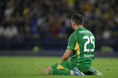 Boca Juniors' goalkeeper #25 Agustin Marchesin reacts after the shootout of the Copa Libertadores qualification second round second leg football match between Argentina's Boca Juniors and Peru's Alianza Lima at the Alberto J. Armando "La Bombonera" stadium in Buenos Aires on February 25, 2025. (Photo by JUAN MABROMATA / AFP)<!-- NICAID(15984132) -->