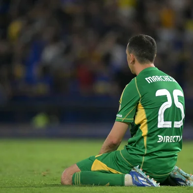 Boca Juniors' goalkeeper #25 Agustin Marchesin reacts after the shootout of the Copa Libertadores qualification second round second leg football match between Argentina's Boca Juniors and Peru's Alianza Lima at the Alberto J. Armando "La Bombonera" stadium in Buenos Aires on February 25, 2025. (Photo by JUAN MABROMATA / AFP)<!-- NICAID(15984132) -->