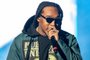 (FILES) In this file photo taken on November 9, 2019, US rapper Takeoff, of the group Migos, performs during the Astroworld Festival at NRG Stadium in Houston, Texas. - The rapper Takeoff, a member of the Grammy-nominated hip hop trio Migos, was fatally shot at a bowling alley in Houston, Texas, on November 1, 2022, according to entertainment outlet TMZ. He was 28 years old. (Photo by SUZANNE CORDEIRO / AFP)Editoria: HUMLocal: HoustonIndexador: SUZANNE CORDEIROSecao: celebrityFonte: AFPFotógrafo: STR<!-- NICAID(15252422) -->