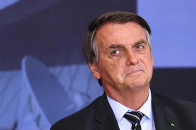 Brazilian President Jair Bolsonaro gestures during the Marechal Rondon Communications Award ceremony at the Planalto Palace in Brasilia, on September 14, 2021. (Photo by EVARISTO SA / AFP)<!-- NICAID(14890755) -->