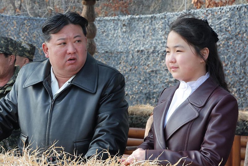This picture taken on March 15, 2024 and released from North Korea's official Korean Central News Agency (KCNA) on March 16 shows North Korean leader Kim Jong Un (3rd R) and his daughter Ju Ae (2nd R) inspecting a training of the Korean People's Army at an undisclosed location in North Korea. (Photo by KCNA VIA KNS / AFP) / South Korea OUT / REPUBLIC OF KOREA OUT ---EDITORS NOTE--- RESTRICTED TO EDITORIAL USE - MANDATORY CREDIT "AFP PHOTO/KCNA VIA KNS" - NO MARKETING NO ADVERTISING CAMPAIGNS - DISTRIBUTED AS A SERVICE TO CLIENTS / THIS PICTURE WAS MADE AVAILABLE BY A THIRD PARTY. AFP CAN NOT INDEPENDENTLY VERIFY THE AUTHENTICITY, LOCATION, DATE AND CONTENT OF THIS IMAGE --- / <!-- NICAID(15708767) -->