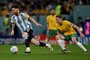 Argentina's forward #10 Lionel Messi is challenged by Australia's defender #04 Kye Rowles during the Qatar 2022 World Cup round of 16 football match between Argentina and Australia at the Ahmad Bin Ali Stadium in Al-Rayyan, west of Doha on December 3, 2022. (Photo by MANAN VATSYAYANA / AFP)Editoria: SPOLocal: DohaIndexador: MANAN VATSYAYANASecao: soccerFonte: AFPFotógrafo: STF<!-- NICAID(15284884) -->