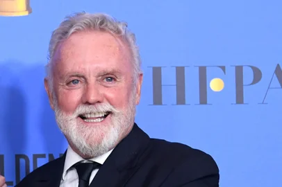 BEVERLY HILLS, CA - JANUARY 06: Best Actor in a Motion Picture Drama for 'Bohemian Rhapsody' winner Rami Malek (C) with Brian May and Roger Taylor of Queen pose in the press room during the 76th Annual Golden Globe Awards at The Beverly Hilton Hotel on January 6, 2019 in Beverly Hills, California.   Kevin Winter/Getty Images/AFP<!-- NICAID(13904219) -->