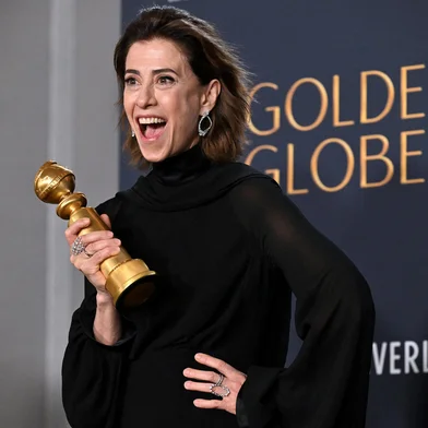 Brazilian actress Fernanda Torres poses with the Best Performance by a Female Actor in a Motion Picture  Drama award for "I'm Still Here" in the press room during the 82nd annual Golden Globe Awards at the Beverly Hilton hotel in Beverly Hills, California, on January 5, 2025. (Photo by Robyn Beck / AFP)<!-- NICAID(15947869) -->