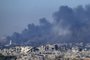 This picture taken from southern Israel near the border with the Gaza Strip shows smoke billowing following an Israeli strike on the Palestinian territory on November 21, 2023, amid ongoing battles between Israel and the Palestinian Hamas movement. (Photo by John MACDOUGALL / AFP)<!-- NICAID(15603825) -->