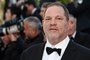 (FILES) This file photo taken on May 22, 2015 shows US producer Harvey Weinstein arriving for the screening of the film "The Little Prince" at the 68th Cannes Film Festival in Cannes.    Weinstein was fired from his film studio the Weinstein Company on October 8, 2017, following reports that he sexually harassed women over several decades, according to US media. / AFP PHOTO / LOIC VENANCE<!-- NICAID(13200110) -->