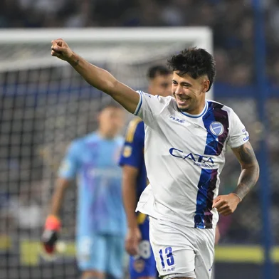 Godoy Cruz's Uruguayan midfielder #13 Roberto Fernandez celebrates after scoring during the Argentine Professional Football League Tournament 2024 'Cesar Luis Menotti' match between Boca Juniors and Godoy Cruz at 'La Bombonera' Stadium in Buenos Aires on November 6, 2024. (Photo by Luis ROBAYO / AFP)Editoria: SPOLocal: Buenos AiresIndexador: LUIS ROBAYOSecao: soccerFonte: AFPFotógrafo: STF<!-- NICAID(15997675) -->