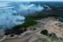Aerial view of a fire in the Amazon rainforest in Iranduba, Amazonas, northern Brazil, on September 23, 2023. The Amazonas is suffering a severe drought that is affecting navigation and the distribution of fuel and food to the interior, following which the government of Amazonas declared a State of Environmental Emergency on September 12. (Photo by Michael Dantas / AFP)Editoria: DISLocal: IrandubaIndexador: MICHAEL DANTASSecao: droughtFonte: AFPFotógrafo: STR<!-- NICAID(15554371) -->
