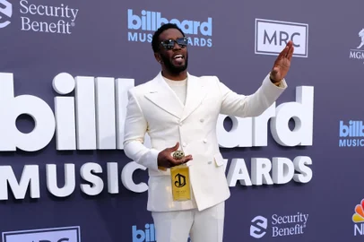(FILES) US producer-musician Sean "Diddy" Combs attends the 2022 Billboard Music Awards at the MGM Grand Garden Arena in Las Vegas, Nevada, May 15, 2022. Combs will plead not guilty on September 17, 2024, to racketeering and sex trafficking charges, his lawyer said ahead of a court appearance by the superstar rapper. Combs, 54, was arrested on September 16 by federal agents acting on a sealed indictment filed by the US Attorney for the Southern District of New York. (Photo by Maria Alejandra CARDONA / AFP)<!-- NICAID(15874781) -->