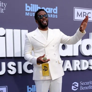 (FILES) US producer-musician Sean "Diddy" Combs attends the 2022 Billboard Music Awards at the MGM Grand Garden Arena in Las Vegas, Nevada, May 15, 2022. Combs will plead not guilty on September 17, 2024, to racketeering and sex trafficking charges, his lawyer said ahead of a court appearance by the superstar rapper. Combs, 54, was arrested on September 16 by federal agents acting on a sealed indictment filed by the US Attorney for the Southern District of New York. (Photo by Maria Alejandra CARDONA / AFP)<!-- NICAID(15874781) -->