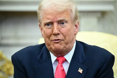 US President Donald Trump speaks during a meeting with Irish Prime Minister Micheal Martin in the Oval Office of the White House in Washington, DC, on March 12, 2025. (Photo by Mandel NGAN / AFP)<!-- NICAID(15994824) -->