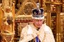 Britain's King Charles III, wearing the Imperial State Crown and the Robe of State, sits on The Sovereign's Throne in the House of Lords chamber, during the State Opening of Parliament, at the Houses of Parliament, in London, on November 7, 2023. (Photo by Leon Neal / POOL / AFP)<!-- NICAID(15589726) -->