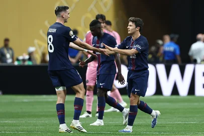 Paris Saint-Germain's Portuguese midfielder #87 Joao Pedro Goncalves Neves (R) celebrates with Paris Saint-Germain's Spanish midfielder #08 Fabian Ruiz (L) after scoring Paris Saint-Germain's second goal during the FIFA Club World Cup 2025 round of 16 football match between France's Paris Saint-Germain and US Inter Miami at the Mercedes-Benz Stadium in Atlanta on June 29, 2025. (Photo by FRANCK FIFE / AFP)<!-- NICAID(16069751) -->